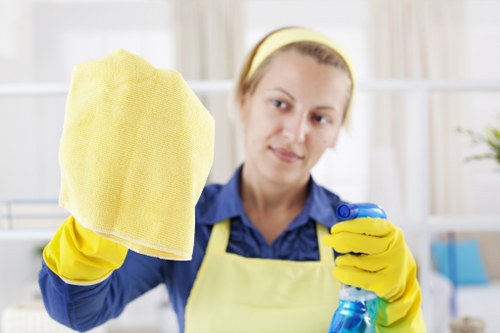After builders cleaning service removing dust from a renovated property in N7