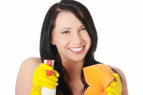 Worker using protective measures during carpet cleaning operations